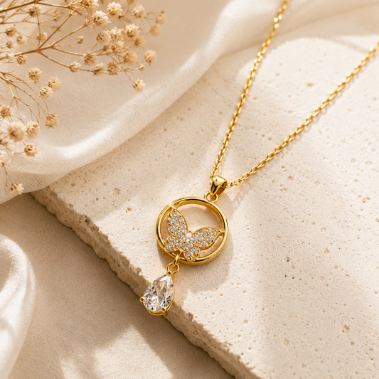 Close-up of Butterfly Crystal Drop Pendant Necklace – Gold Plated | Sultan Jewelers