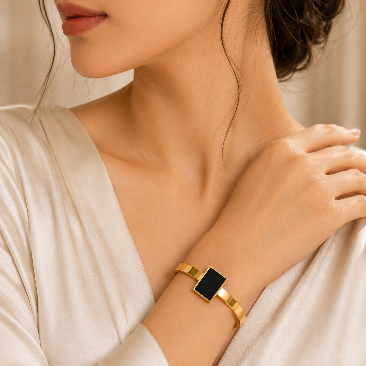 Woman wearing Luxury Black Rectangle Gold Bracelet for Women | Sultan Jewelers