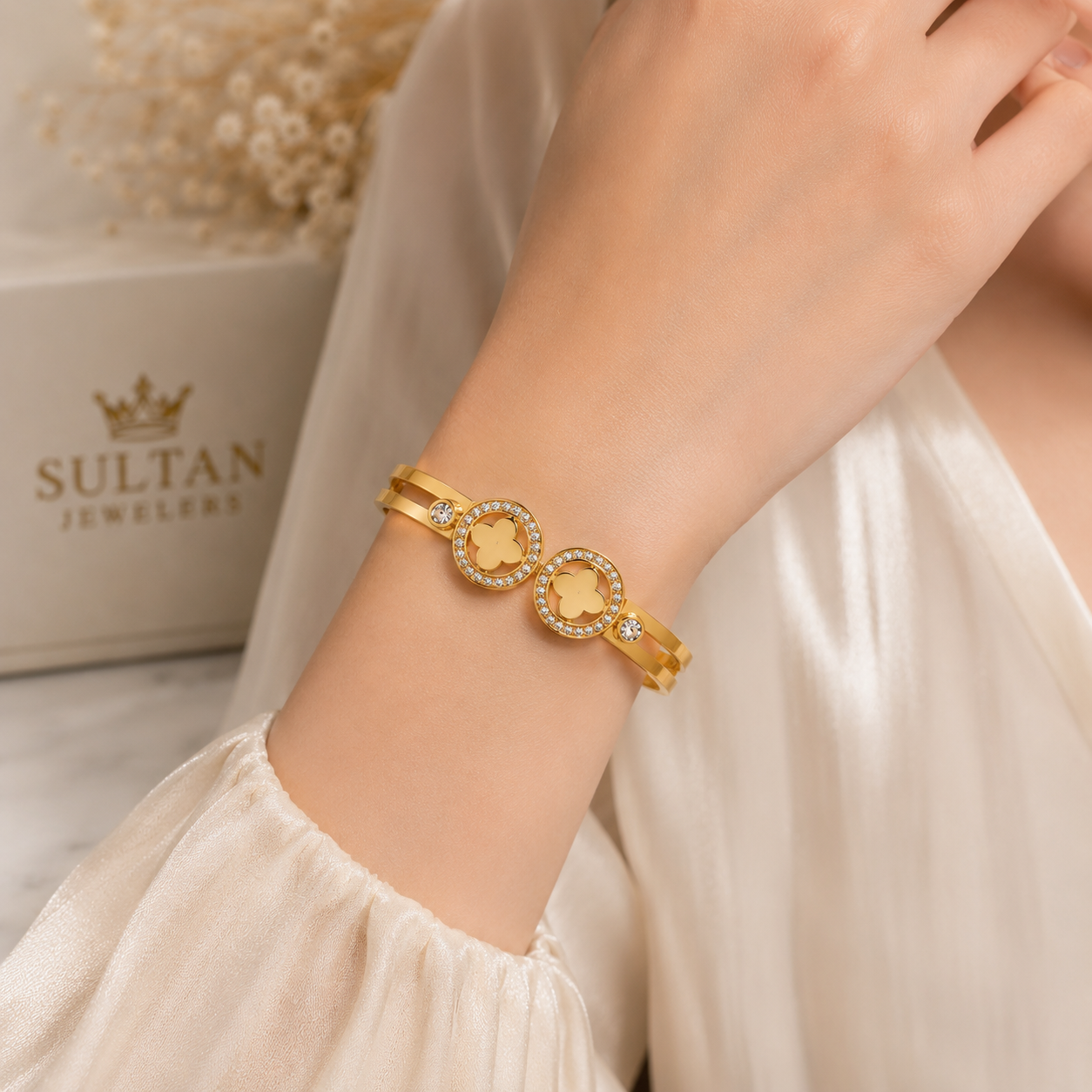 Woman wearing Gold Plated Double Clover Crystal Bracelet | Sultan Jewelers