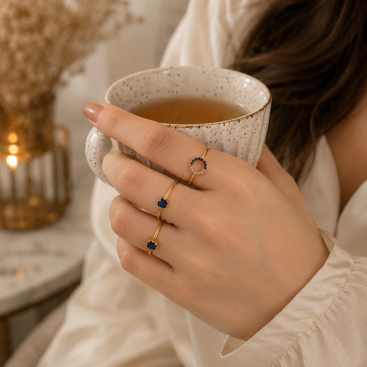 Woman wearing Gold-Plated Adjustable Sapphire Ring Set | Sultan Jewelers