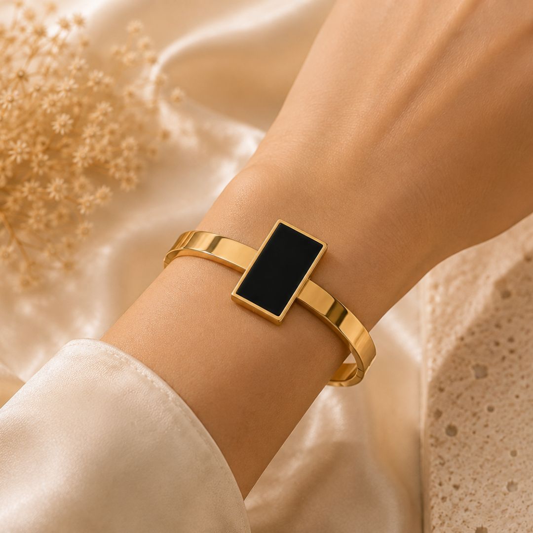 Woman wearing Luxury Black Rectangle Gold Bracelet for Women | Sultan Jewelers