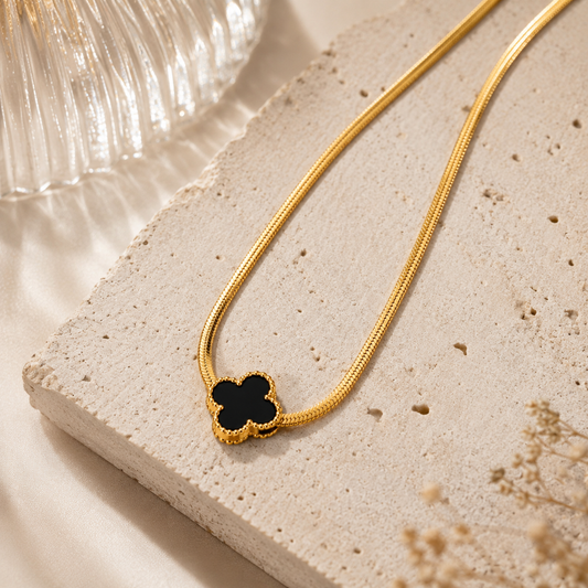 Close-up of Gold Clover Pendant Necklace – Black Enamel | Sultan Jewelers