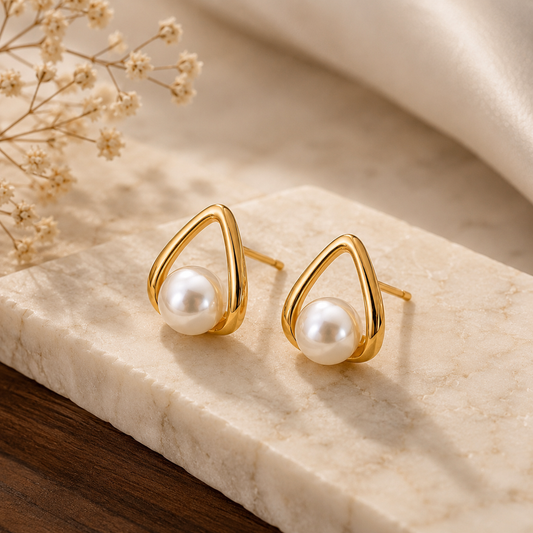 Close-up of Elegant Pearl Drop Gold Stud Earrings for Women  | Sultan Jewelers