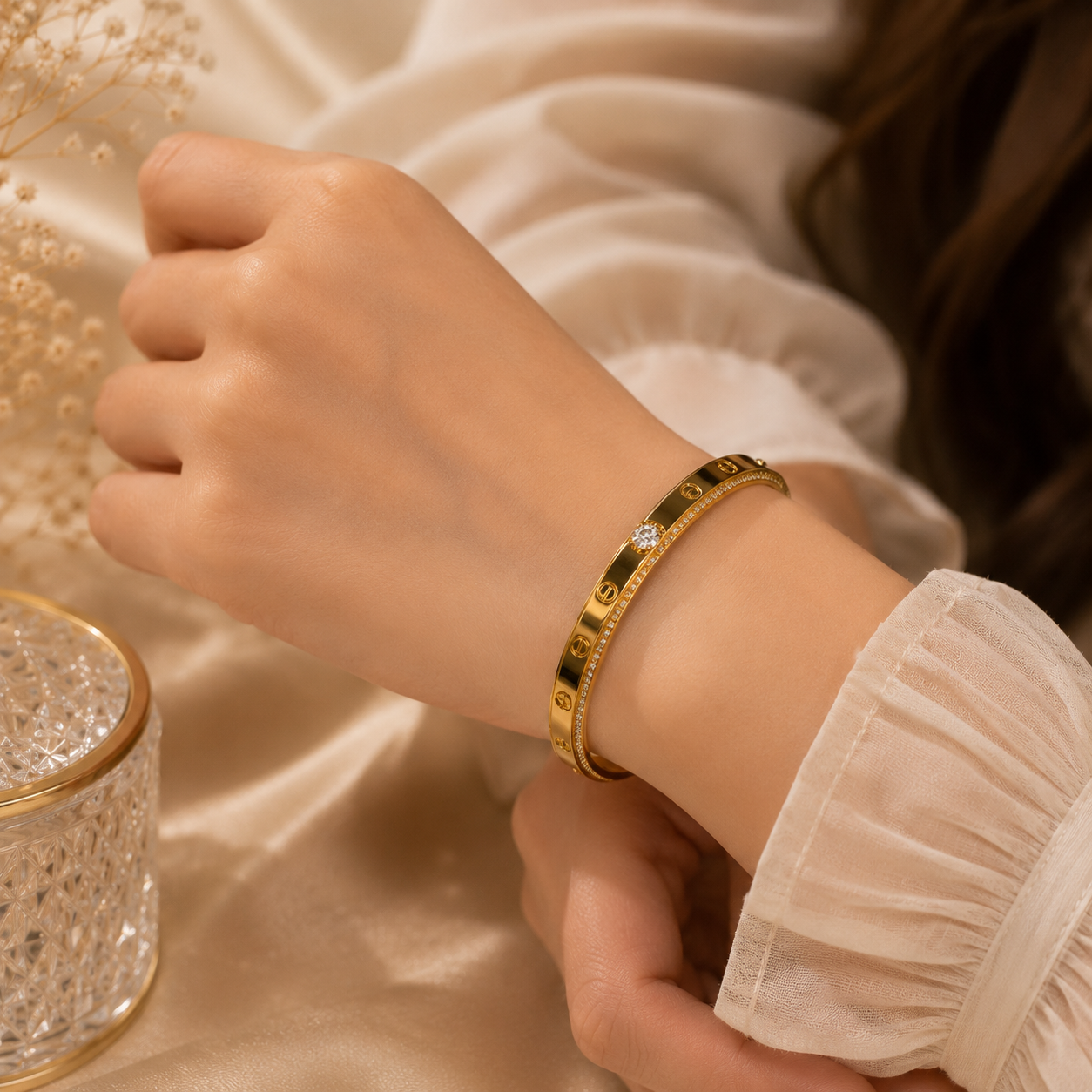 Woman wearing Gold Plated Stainless Steel Crystal Screw Bracelet | Sultan Jewelers