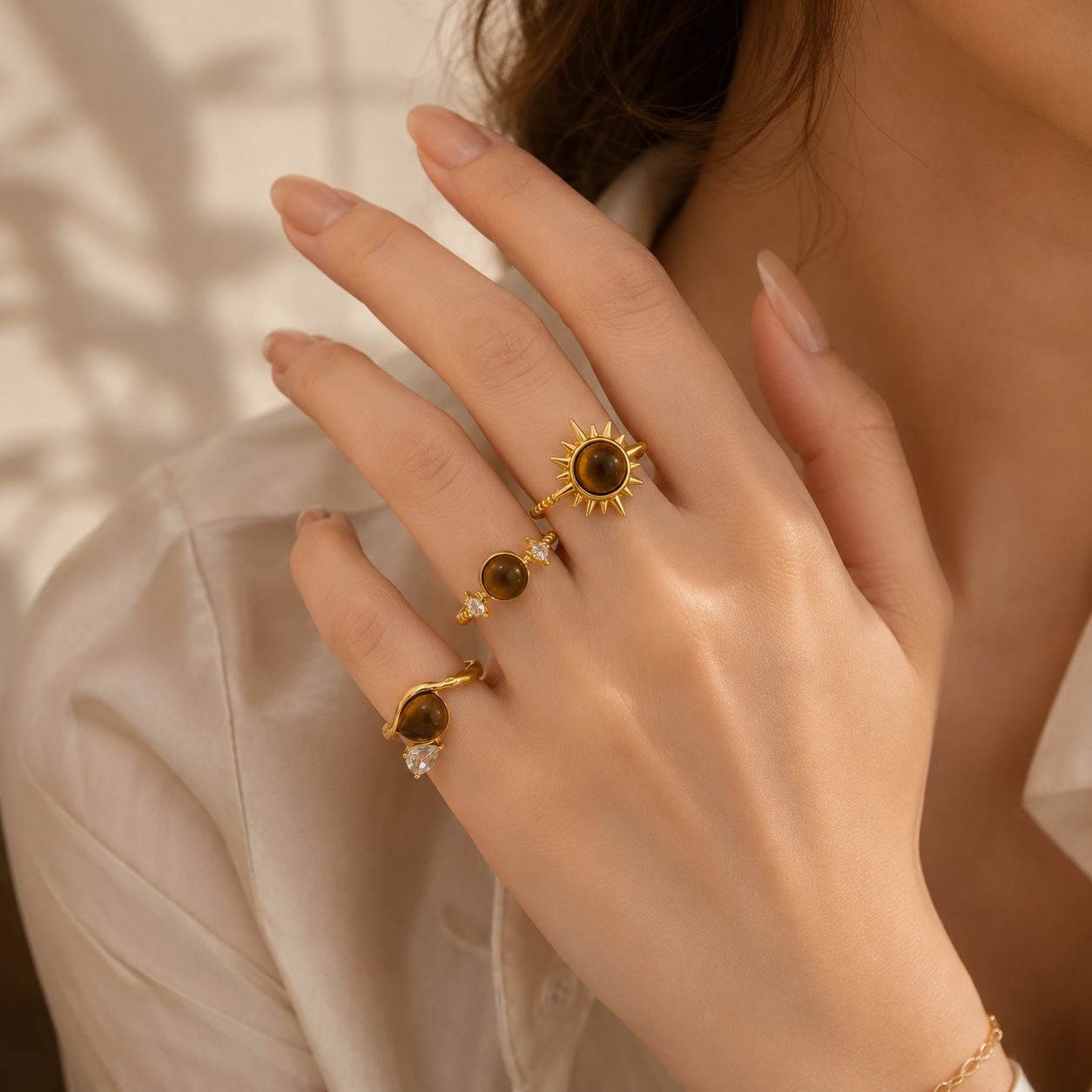 Woman wearing Celestial Tiger Eye Gold Ring Set – 3 Pcs Adjustable Rings for Women] | Sultan Jewelers