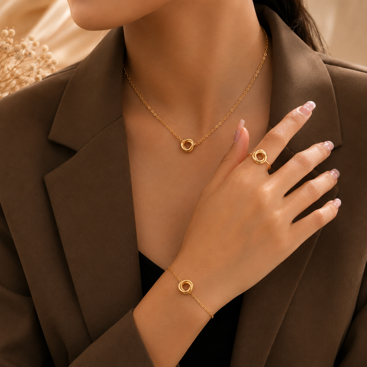 Woman wearing Gold-Plated Infinity Knot Jewelry Set | Sultan Jewelers