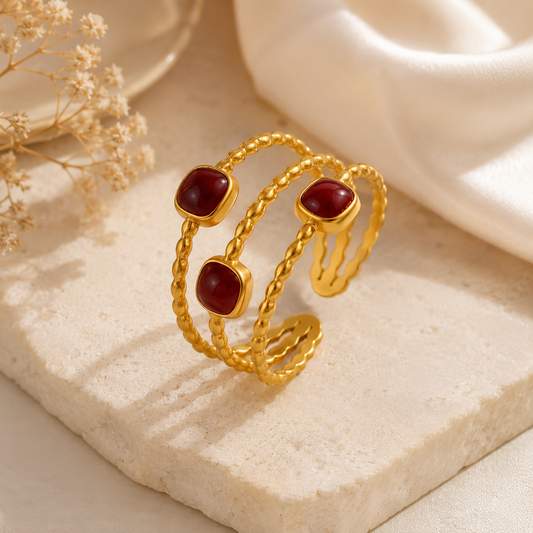 Close-up product image of the Triple Band Adjustable Ring with premium gold-plated finish.
